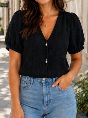NWT Textured Top with short puff sleeves and pearl button Black Size S